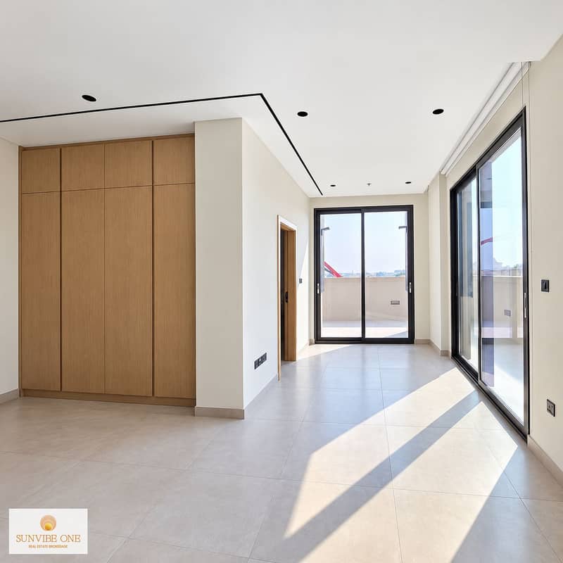 6 Sunlit Minimalist Interior with Balcony Views. png