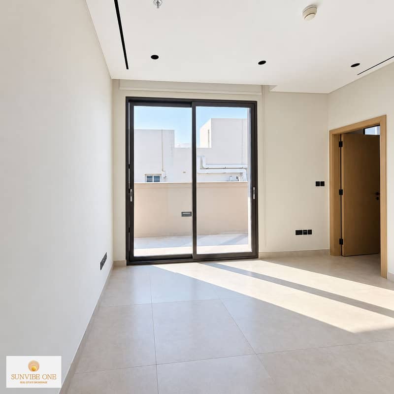 8 Sunlit Minimalist Room with Balcony Door. png