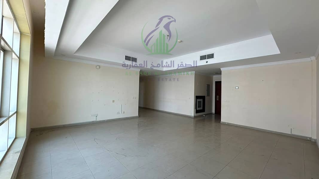 10 apartment-for-rent-2-bedroom-altaawn-alsharqh-living-room-06. jpg