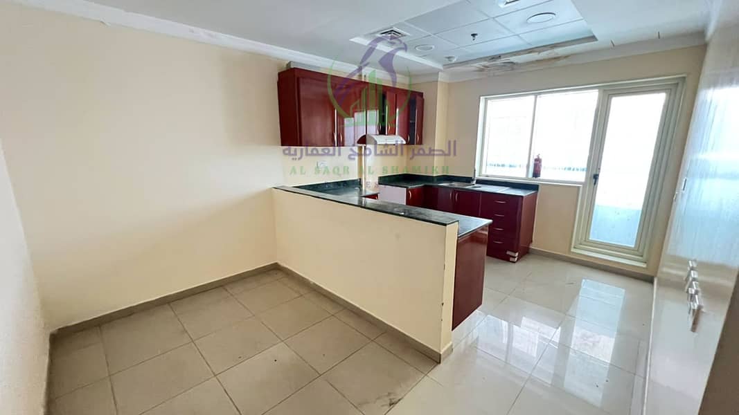 18 apartment-for-rent-3-bedroom-altaawn-alsharqh-kitchen-15. jpg