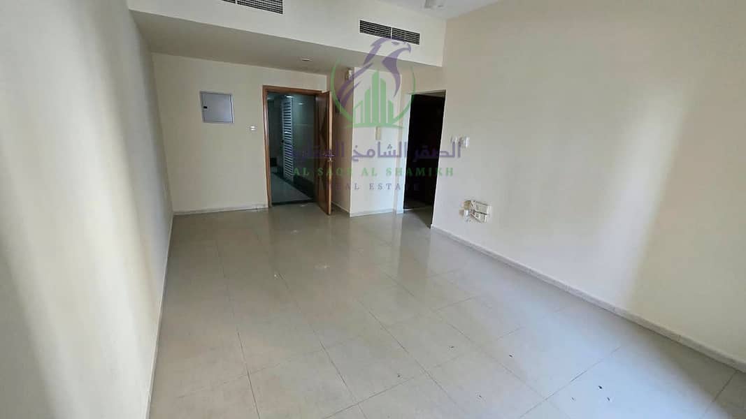 7 apartment-for-rent-1-bedroom-altaawn-alsharqh-living-room-02. jpg