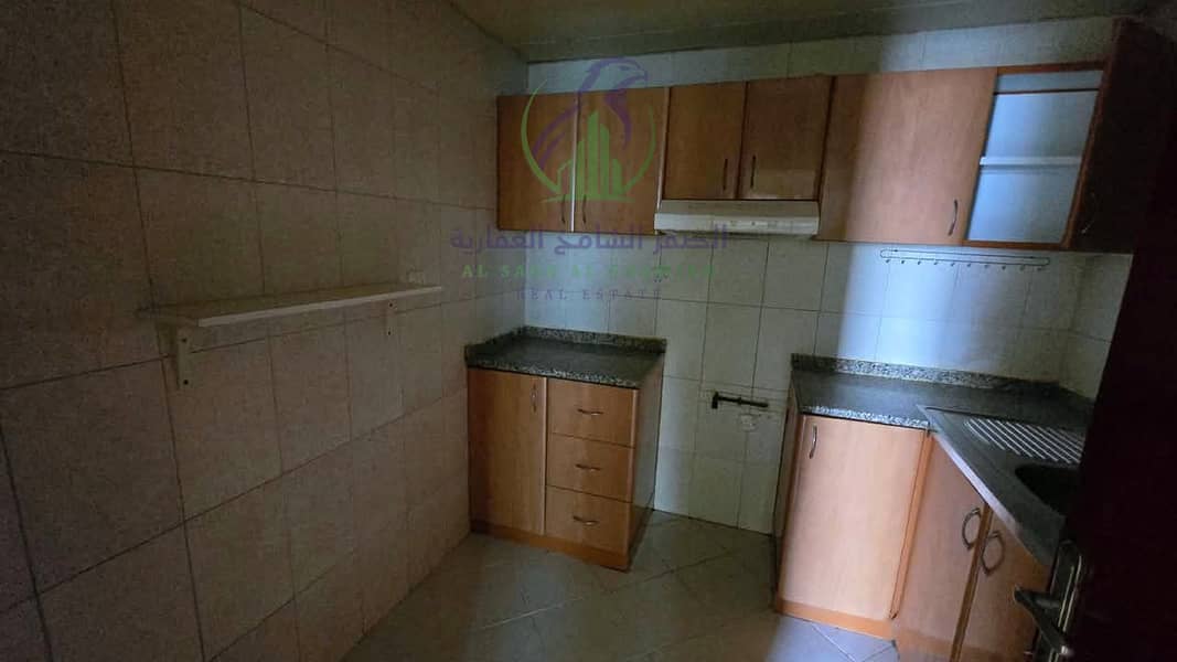 11 apartment-for-rent-1-bedroom-altaawn-alsharqh-kitchen-11. jpg