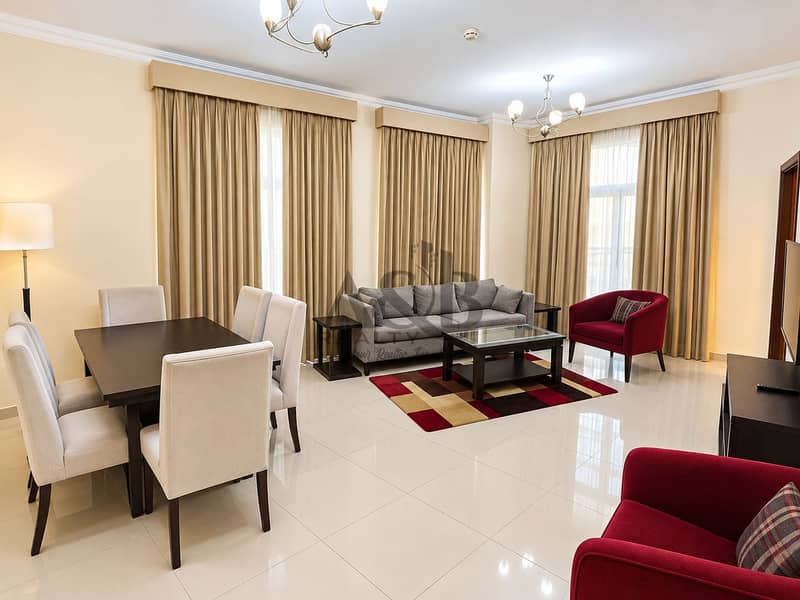2 Elegant Staged Living and Dining Room. png