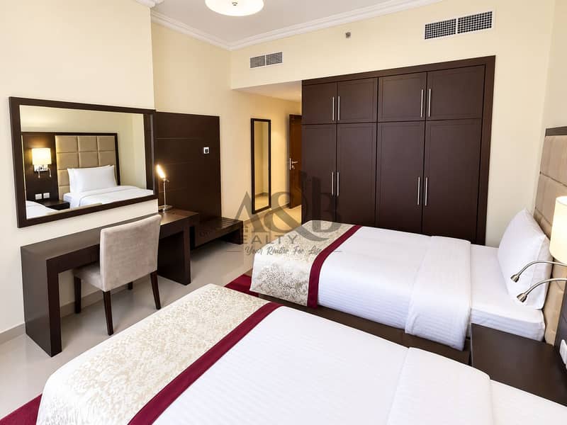 10 Bright Modern Twin-Bed Hotel Room. png