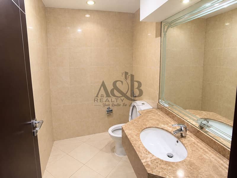 18 Modern Beige Marble Bathroom. png