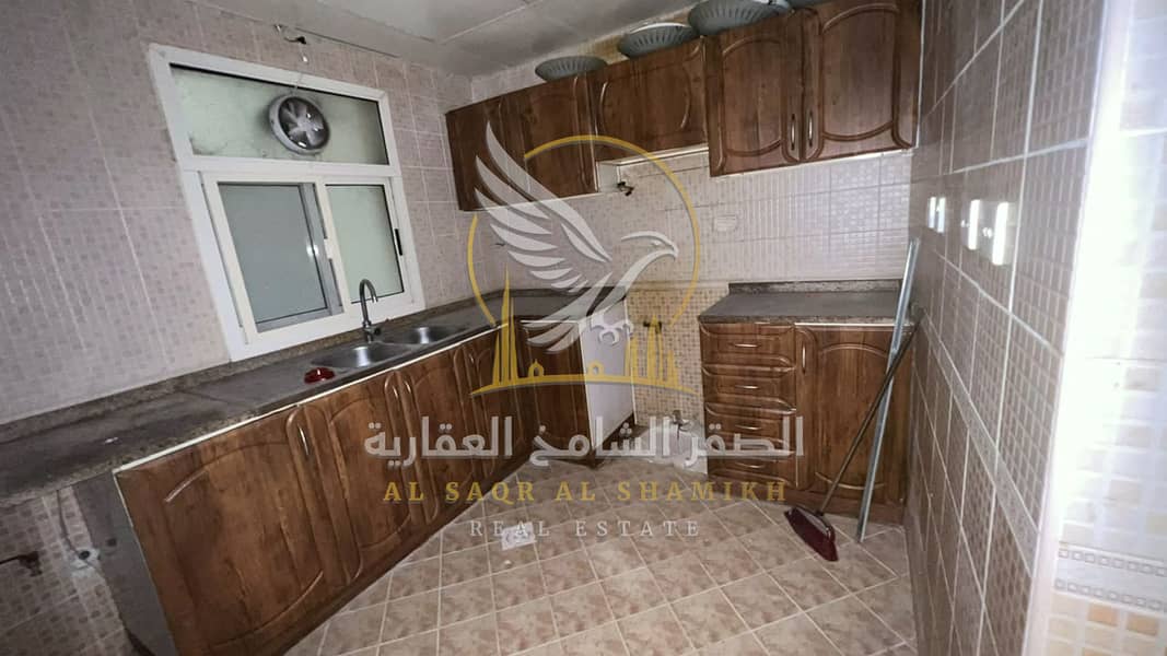 13 غرفة-وصالة-للا-يجار-2-غرف-البوطينة-الشارقة-صورة-العقار-yt-001-03. jpg