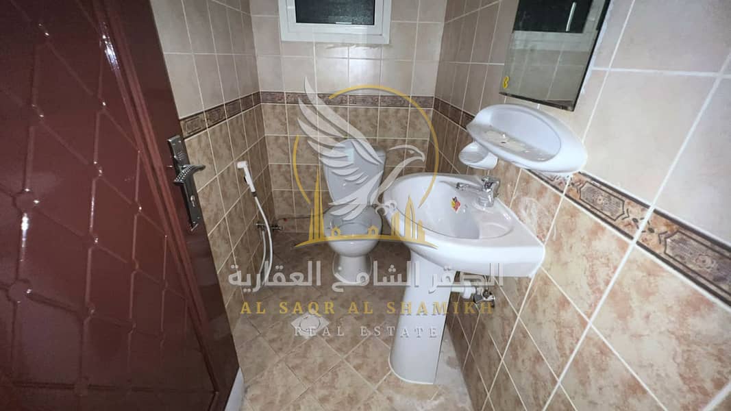 14 غرفة-وصالة-للا-يجار-2-غرف-البوطينة-الشارقة-صورة-العقار-yt-001-02. jpg