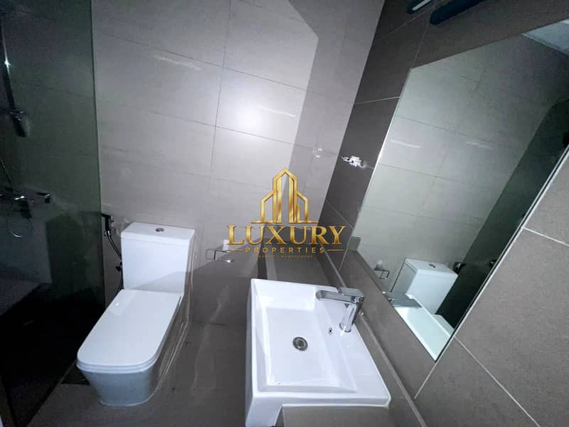 12 Modern 1 BHK | Balcony | 2 Bathrooms | Prime Location