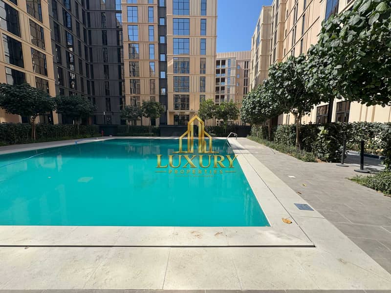 16 Modern 1 BHK | Balcony | 2 Bathrooms | Prime Location