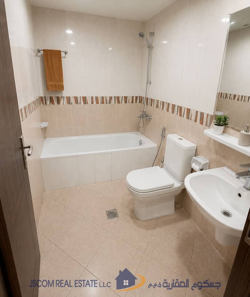 4 Modern Beige-Tiled Bathroom Interior. png