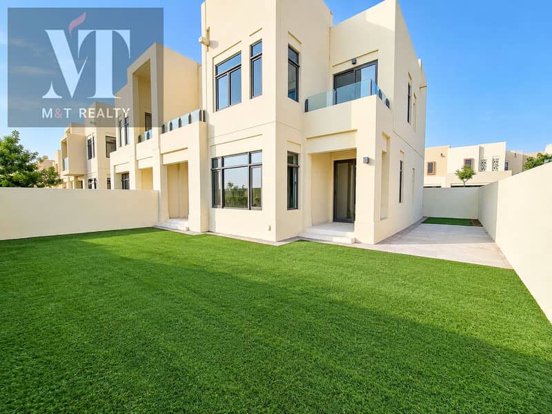 2 Modern Cream Townhouse with Landscaped Lawn. png