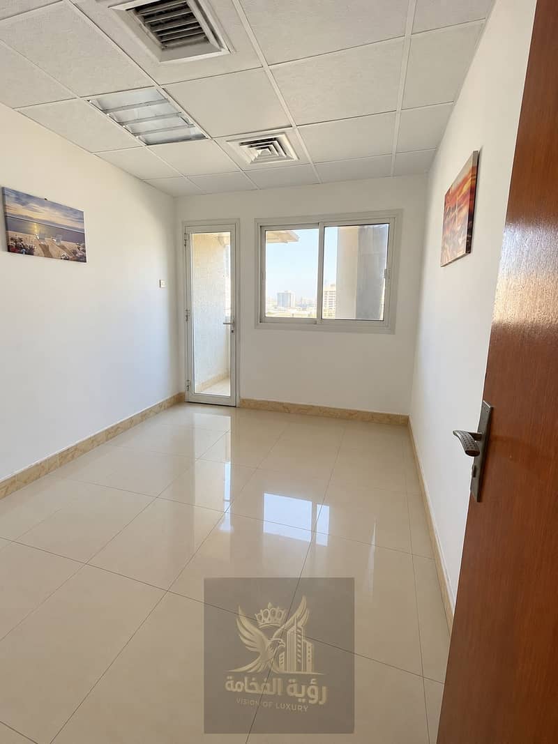 7 Clean Empty Office with City View. png