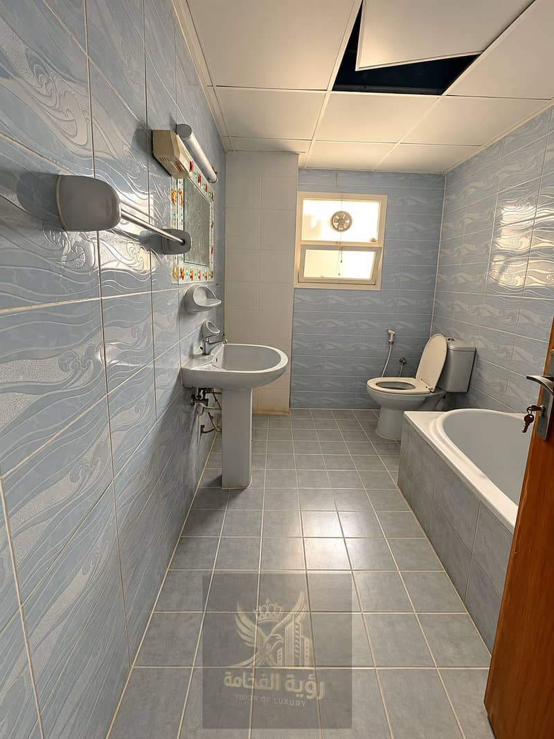 13 Clean Narrow Bathroom Interior. png