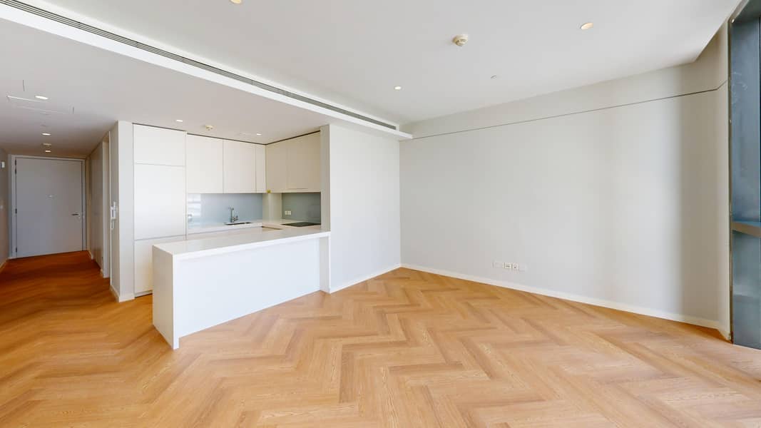 10 34NT-1BHK-06-T3-Living-Room. jpg