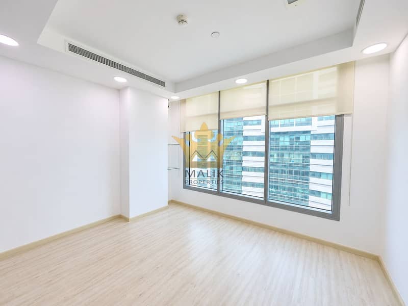 3 Bright Empty Office with Urban Views (1). png