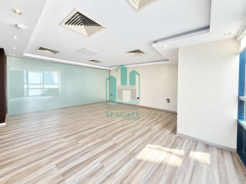 9 Bright Modern Office with Glass Partitions. png