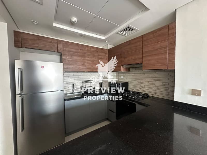 14 Vacant | Fully Furnished 1BR + Maid’s Room | Pool & Community View