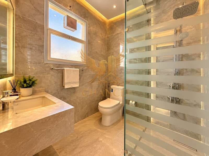 9 Warm Luxury Marble Bathroom. png