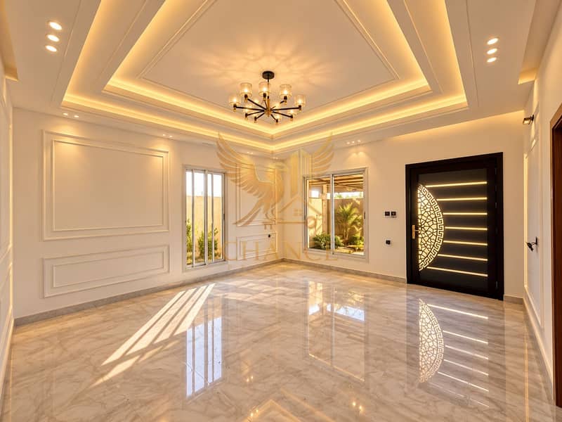 12 Warm Modern Foyer with Marble Reflections. png