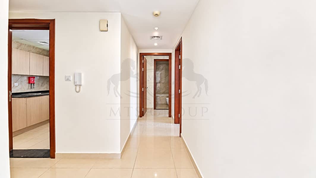 4 Modern Apartment Hallway with Kitchen View. png