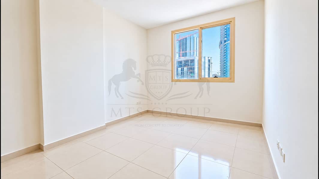 9 Bright Minimalist Bedroom with City View. png