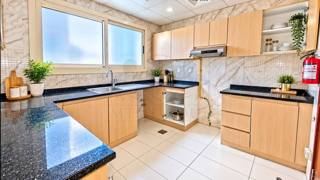 12 Bright Modern Kitchen with Warm Wood Accents. png