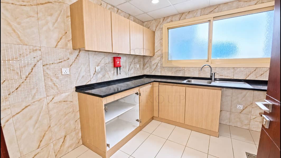 13 Bright Modern Kitchenette with Fire Blanket. png
