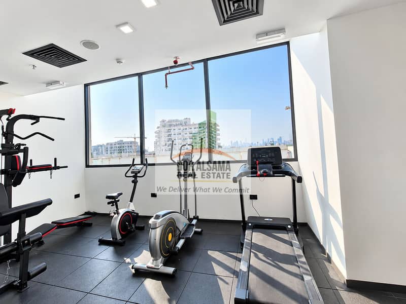 6 Sunlit Modern Gym with City Views. png