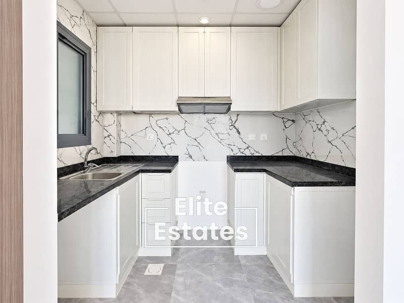 9 Pristine Modern U-Shaped Kitchen. png