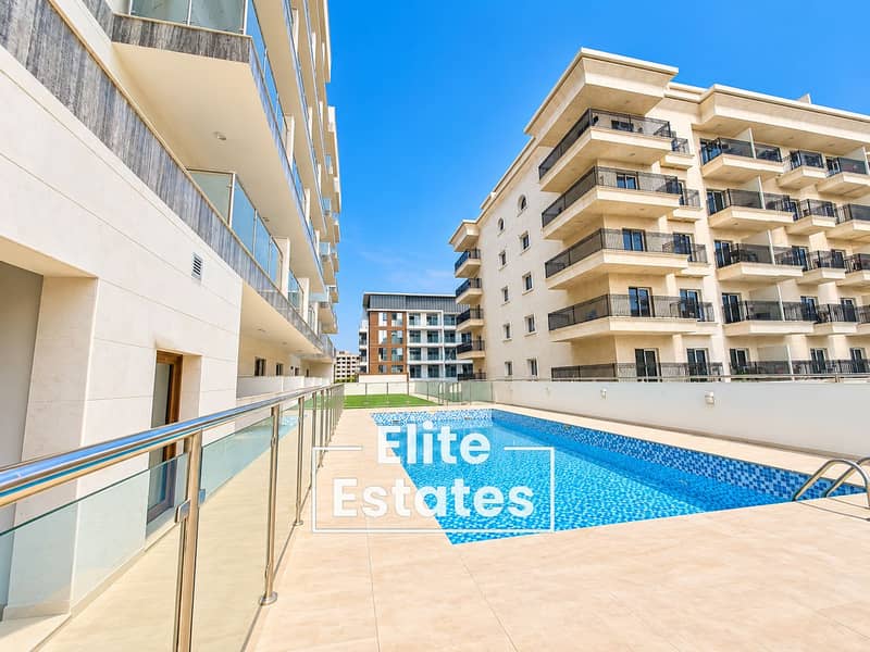 14 Sunlit Modern Apartment Pool Courtyard. png