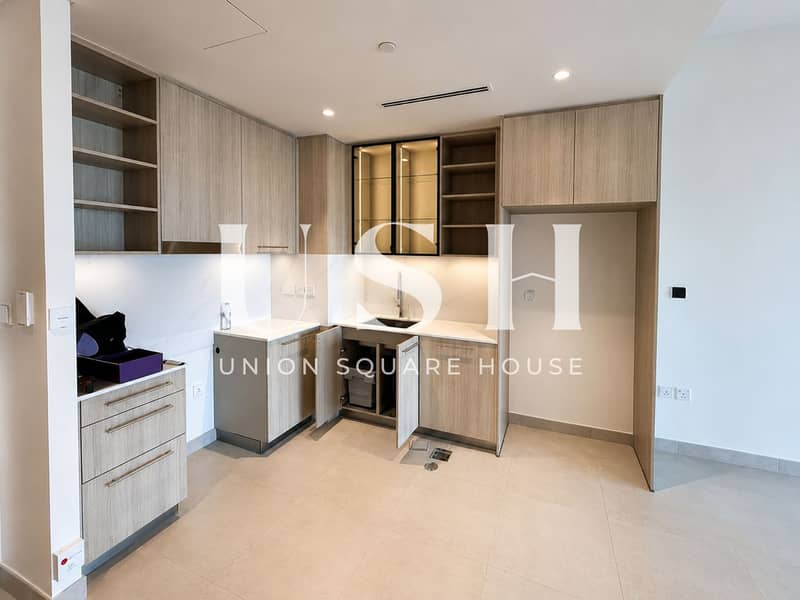 3 Modern Minimalist Kitchen in Warm Neutrals. png