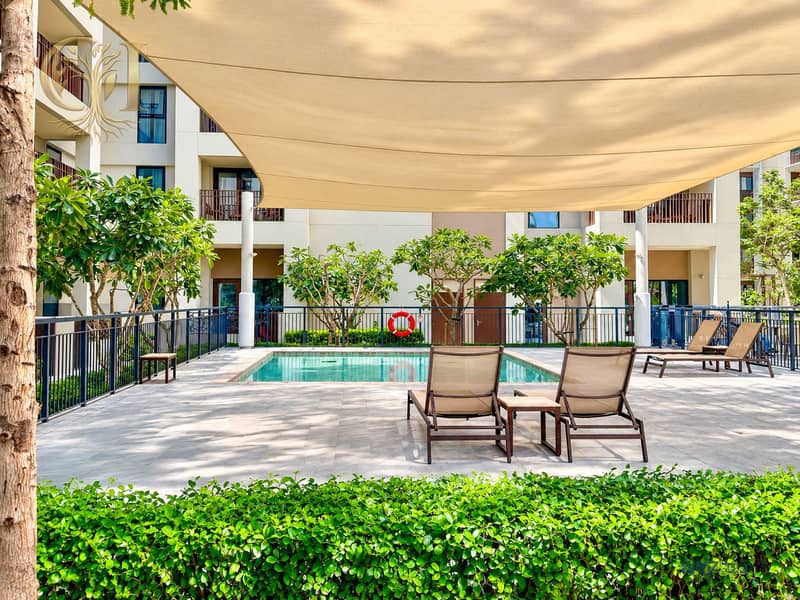 17 Sunlit Condo Courtyard Pool Retreat. png