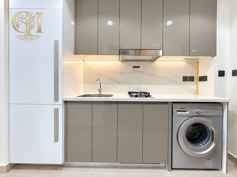 4 Modern Minimalist Kitchenette with Integrated Laundry. png