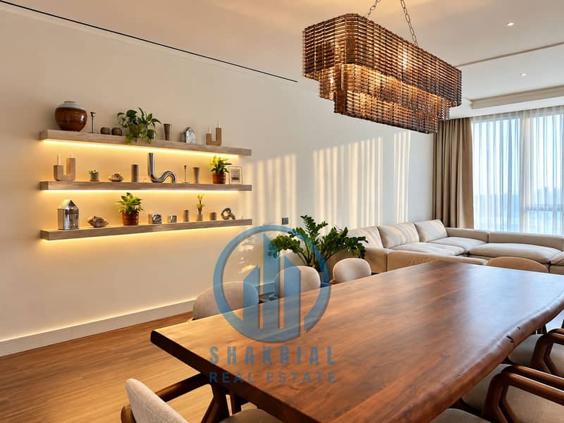 3 Warm Modern Dining Room with Sculptural Chandelier. png