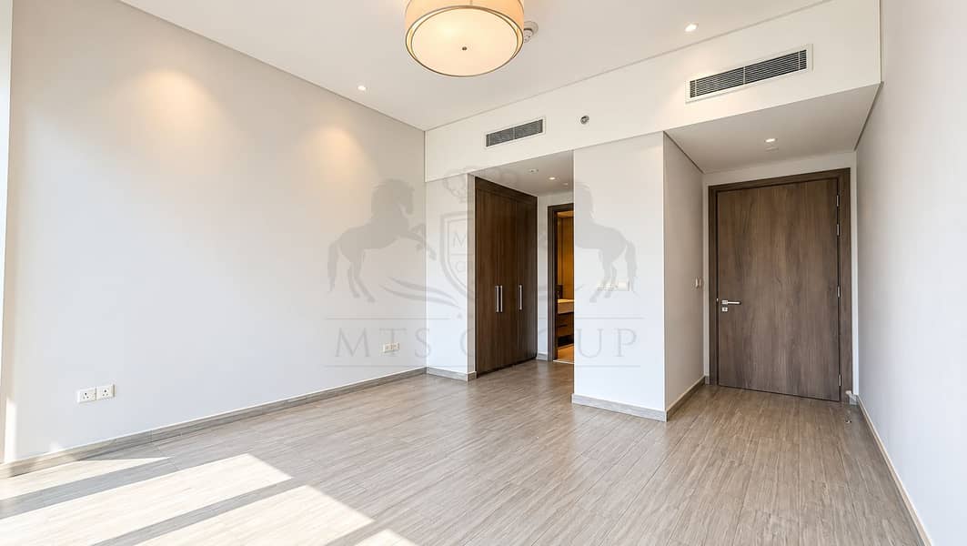 6 Bright Minimalist Room with Wood Accents. png