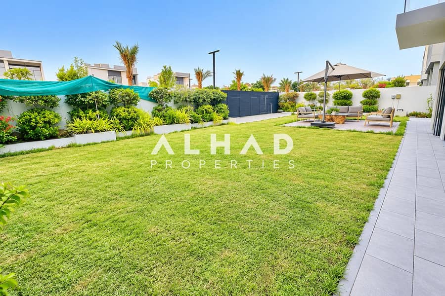 8 Sunny Modern Backyard with Patio Lounge. png