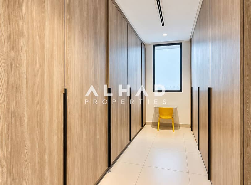 25 Modern Oak Wardrobe Corridor with Yellow Chair. png