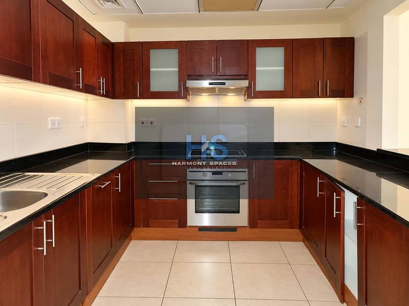 11 Modern Cherrywood U-Shaped Kitchen. png