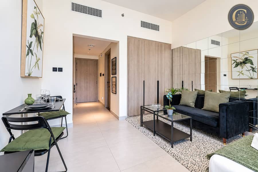 3 Modern Green-Accented Studio Interior. png
