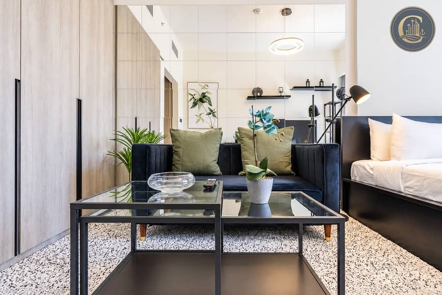 4 Modern Mirrored Studio with Navy Sofa. png