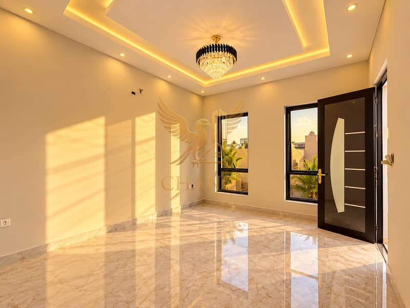 10 Sunlit Modern Room with Crystal Chandelier. png
