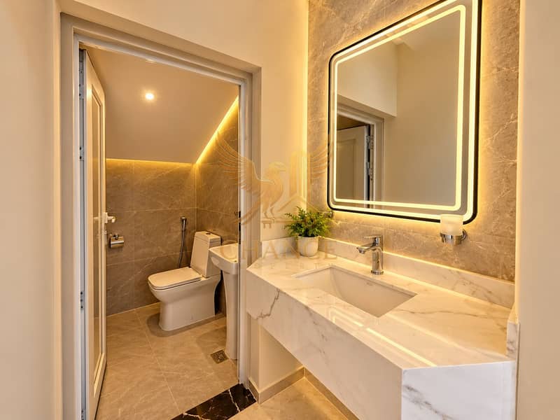 11 Warm Marble Half-Bathroom with LED Mirror. png