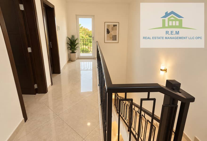 6 Sunlit Minimalist Hallway with Balcony View. png