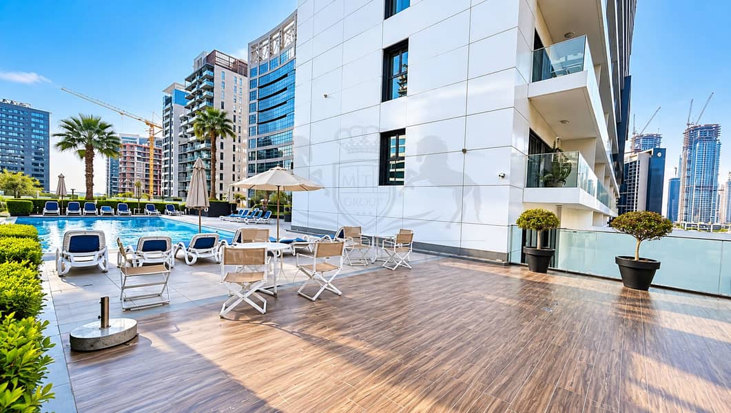 9 Modern Rooftop Pool with City Skyline. png