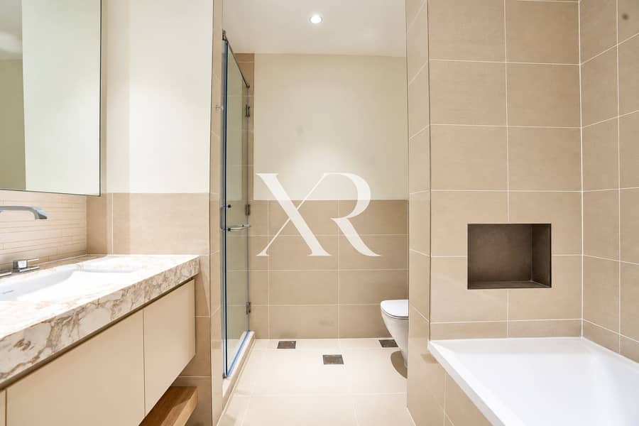 16 Modern Beige-Tiled Bathroom Retreat. png