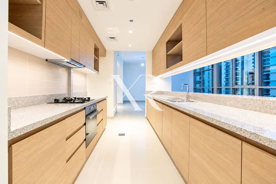 6 Modern Galley Kitchen with City Views. png