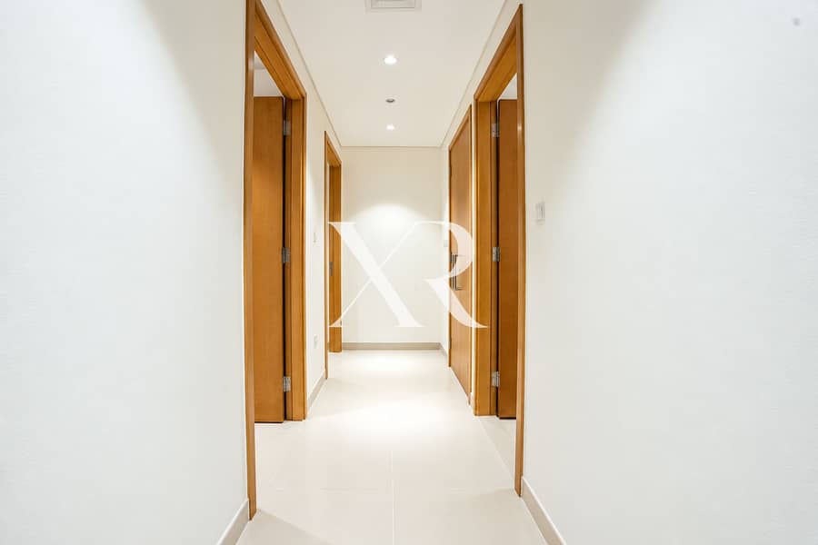 8 Symmetrical Modern Hallway with Oak Doors. png