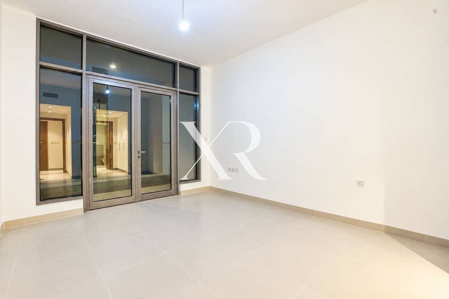 10 Empty Modern Room with Glass Patio Doors. png
