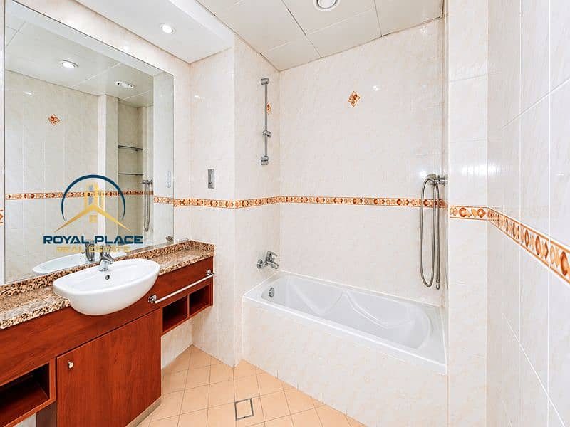 11 Bright Modern Bathroom with Warm Tile Accents_10_11zon. png