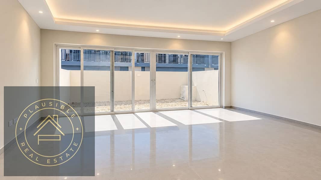 4 Bright Minimalist Living Room with Glass Doors. png